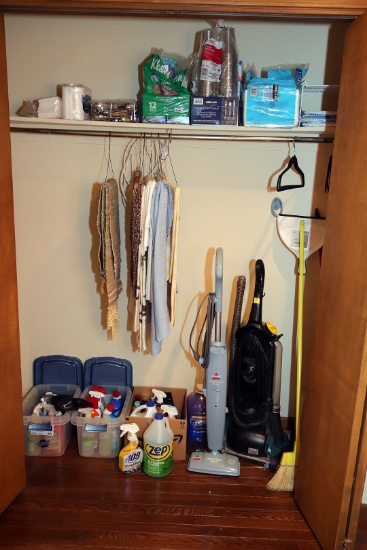 Contents of hall closet: Dyson sweeper, Bissel steam mop, Eureka smart vac, cleaning supplies and ot