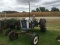 FORD 4000 TRACTOR, GAS, 5 SPEED TRANSMISSION, 3 PT PTO, MISSING TOP LINK, WITH PIE SECTION WEIGHTS