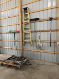 ASSORTED HAND TOOLS INCLUDING RAKES, SHOVELS, BROOMS AND A FIBERGLASS LADDE