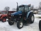 NEW HOLLAND TS110 TRACTOR WITH SIDE MOWER, CAB W/ HEAT & A/C, 3PT, PTO, 4-R