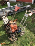 HOMELITE R-5 FRONT TINE ROTOTILLER, RUNNING CONDITION UNKNOWN. INCLUDES ANOTHER FRONT TINE ROTOTILLE