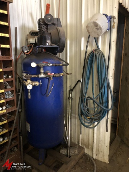 CAMPBELL HAUSFELD APPROX. 60 GALLON CAPACITY VERTICAL AIR COMPRESSOR WITH A 240V, SINGLE PHASE ELECT