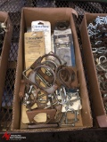 BOX OF ASSORTED AUTOMOTIVE EXHAUST CLAMPS, U-BOLTS, NEW STRAP STYLE EXHAUST CLAMPS, AND VARIOUS OTHE