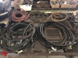 ASSORTED HYDRAULIC HOSES, COPPER LINE, HEAVY DUTY STEEL WIRE SLINGS, AND REINFORCED RUBBER HOSE.