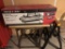 NEW IN BOX PORTER CABLE 24'' OMNIJIG JOINERY SYSTEM, WITH A WOODEN STAND AND SAW HORSE