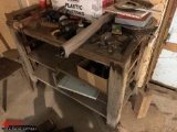 WOODEN BENCH WITH ASSORTED SAW BLADES, PLASTIC SHEETING, HAND TOOLS, AND MORE