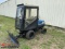 NEW HOLLAND CM274 YARD TRACTOR WITH PLOW BLADE, REAR STEER, SOFT CAB, DIESE