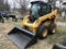 CAT 2420 RUBBER TIRE SKID STEER, CAB, HEAT & AIR, AUX HYDRAULICS, 66'' BUCKET, 2-SPEED, JOYSTICK CON