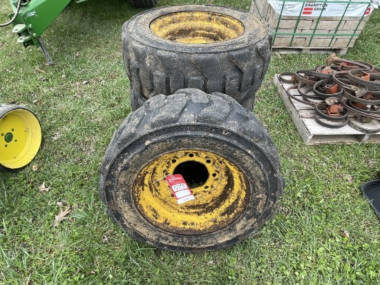10-16.5 SKIDSTEER TIRES ON RIMS OFF A NEW HOLLAND [4]