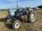 FORD 1710 TRACTOR, OFFSET, DIESEL, PTO, 1-REMOTE (CURRENTLY USED FOR CULTIVATOR), APPROX. 14' MID MO