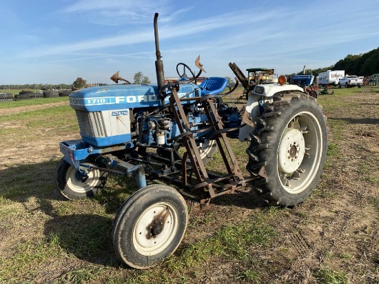 FORD 1710 TRACTOR, OFFSET, DIESEL, PTO, 1-REMOTE (CURRENTLY USED FOR CULTIVATOR), APPROX. 14' MID MO