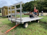 STRAW CHOPPER WITH V-4 WISCONSIN ENGINE MOUNTED ON HAY WAGON, WAS USED TO COVER STRAWBERRY ROWS