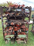 RACK OF ASSORTED G-ALLIS CULTIVATOR PARTS
