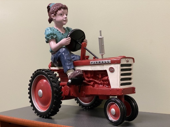 Farmall 560 SpecCast ''Girl on Tractor'' statue, approx. 17'' long x 10-2/2