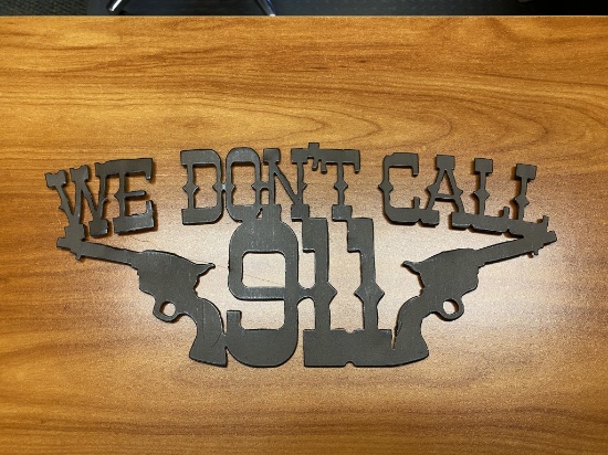 ''We Don't Call 911'' metal sign, 14'' x 6-1/4''