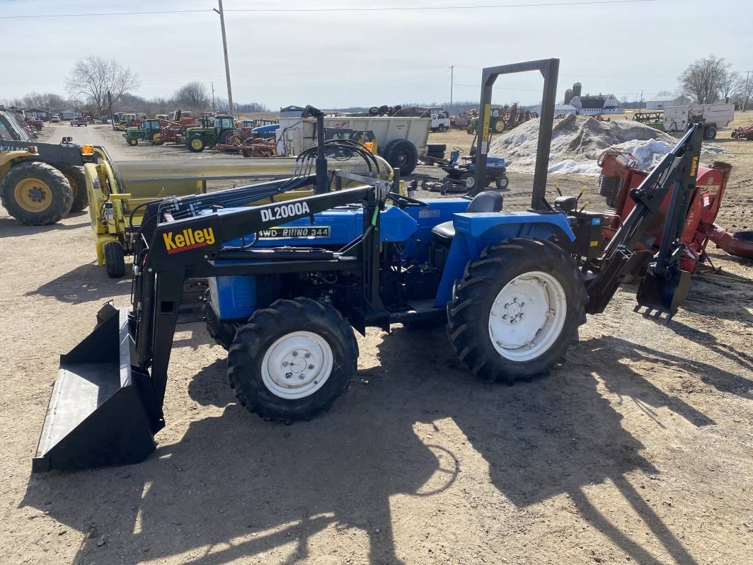 BLACKSTAR TRACTOR RYO INOUE BLACK STAR 青 RHINO 344 TRACTOR, 4WD, WITH DL2000A LOADER, 5' | Proxibid