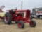 INTERNATIONAL FARMALL 806 TRACTOR, DIESEL, 3PT, PTO, 1-REMOTE, 18.4-34 REAR TIRES, 6872 HOURS SHOWIN
