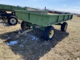 HYDRAULIC DUMP WAGON ON JOHN DEERE GEAR, 11' X 90'' X 14'' SIDES, 11L-15 TIRES.