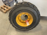 NEW 12-16.5 TIRE & RIM FOR JCB