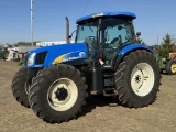 2007 NEW HOLLAND TS135A TRACTOR, MFWD, 3PT, PTO, 2-HYDRAULIC OUTLETS, 520/85R38 REAR TIRES, 16.9R28 