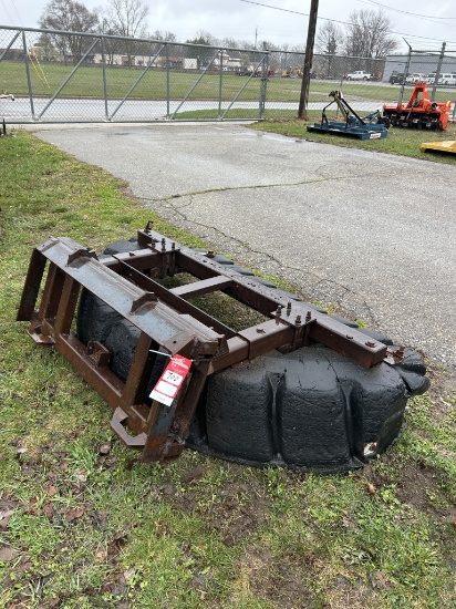 TIRE SCRAPER, SKID STEER MOUNT