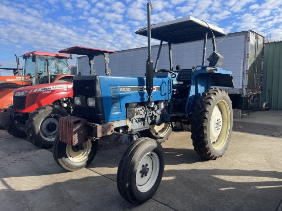 FORD 6530 TRACTOR, 3PT, PTO, 2-REMOTES, CANOPY, 12.4-38 REAR TIRES, 4431 HOURS SHOWING, S/N: 0010656