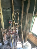 ASSORTED YARD TOOLS, HOES, SHOVELS, AND MORE