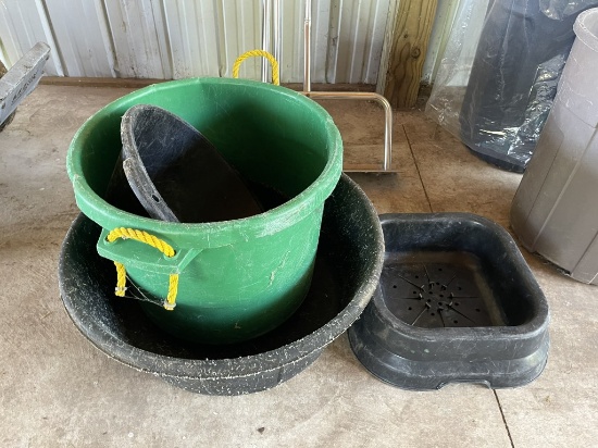 LOT OF ASSORTED PLASTIC AND RUBBER FEED TUBS.