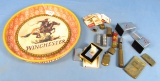 Misc. Lot: Winc. Matchbooks; Winc. Zippo Lighters(2); Winchester Western Table Lighters (2); Brass