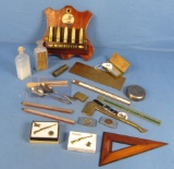 Box Lot Of Variety Of Winchester Memorabilia & Smalls: Oil Bottle; Brass 1940 Calendar; Little Bras