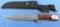 Bowie Knife In Canvas Sheath; Winchester On Blade & Winchester W/horse & Rider On Black Sheath; Lik