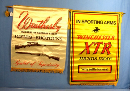 2 Silk Banners; Winchester Xtr; Yellow & Weatherby Rifles & Shotguns; Cream Colored