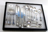 KK a set of 4 silverware pieces; in a display box