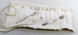 LOT: 12 forks; Simmons silverware; in cloth holder