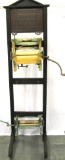 Simmons; hardware store wringer rack; w/2 wringers. “20th Century Wringers every one warranted; Simm
