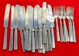 OVB. LOT: 24; 17- table knives; & 7 table forks