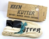 KK. NOS; rotary mower grass catcher No.K200D; in box; price on box $3.99