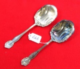 E.C. Simmons. 2 silver serving spoons