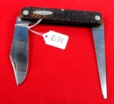Western one blade lock back knife with a sawblade