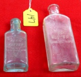 LOT: KK; 2 oil bottles