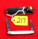 KK; pocket knife; 2 blades; pearl handles No. KO2529; in leather pouch