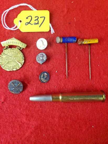 S237: Lot Of 8, Various Winchester Stick Pins, Lapel Pins, Medal And A Bullet Pencil