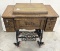 E.C. Simmons Volo sewing machine w/all parts (with key) to cabinet