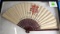 Keen Kutter hand fan fold out with large logo on one side; side contains a floral design