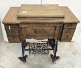 E.C. Simmons Volo sewing machine w/all parts (with key) to cabinet