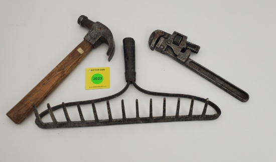 Lot of 3, Winchester 10" pipe wrench, Winchester garden rake (no handle), Winchester claw hammer