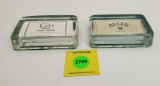Lot of 2 Glass paperweights, Ruger and OLT