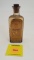 Winchester Gun and Machine Oil glass bottle with paper label, empty
