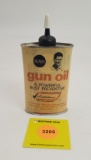 Sears Gun oil paper label over tin can label, full