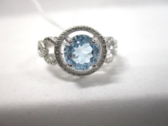 Large Sky Blue Topaz Ring with Diamond accents in sterling silver